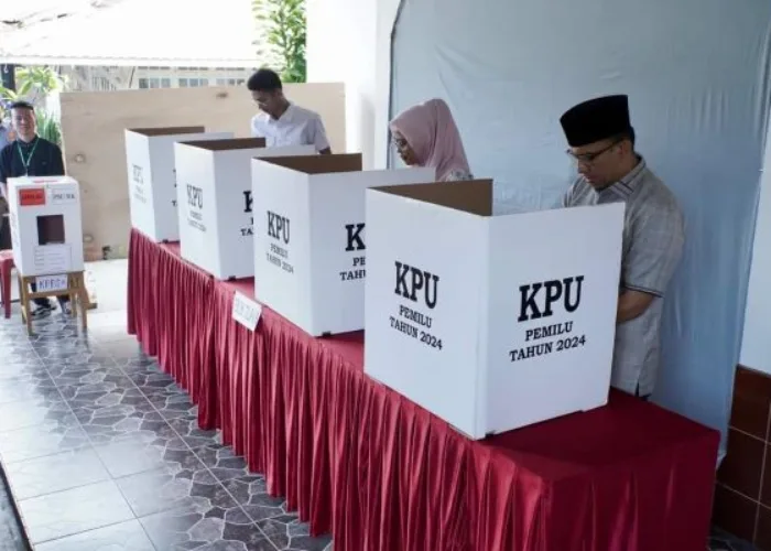 PSU DPD RI, Pj Wako Sonny dan Keluarga Mencoblos di TPS 015 Silaing Bawah