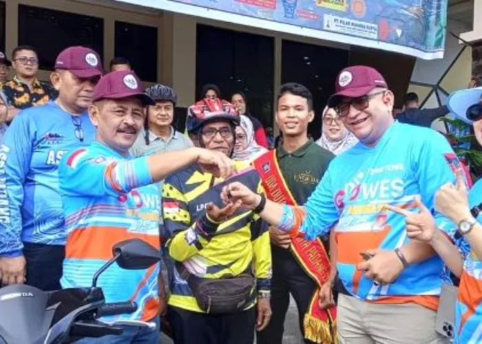 Apri Siswandi Menangkan Doorprize Sepeda Motor Padang Gowes Adventure