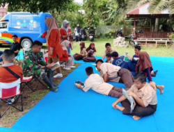 TMMD Kodim 0310/SS Hadirkan Perpustakaan Keliling di Sungai Kambut, Anak-anak Antusias Membaca
