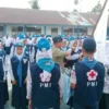 Ketua PMI Kota Padang Lantik 50 Orang Anggota PMR Tingkat Madya SMPN 18 Padang