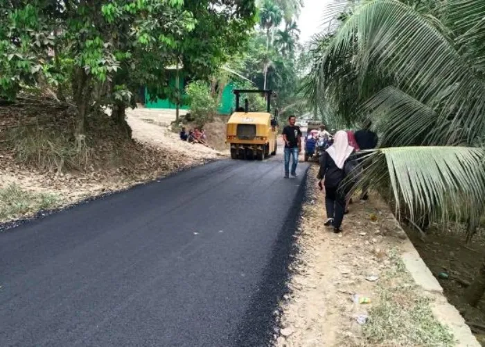 Program CSR PT Kali Dareh Grup Tuntaskan Pengaspalan Jalan Sungai Kilangan Sepanjang 6 Kilometer